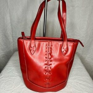 Red Non Leather Bucket Unbranded Tote Bag. Braided red stitching detail.